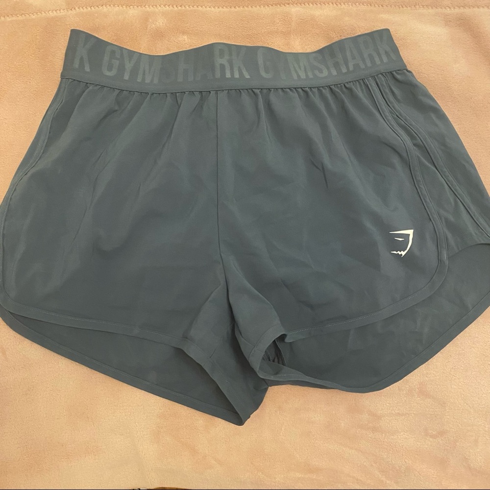 muted blue training shorts